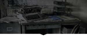 Broken Typewriter on post apocalypse style desk